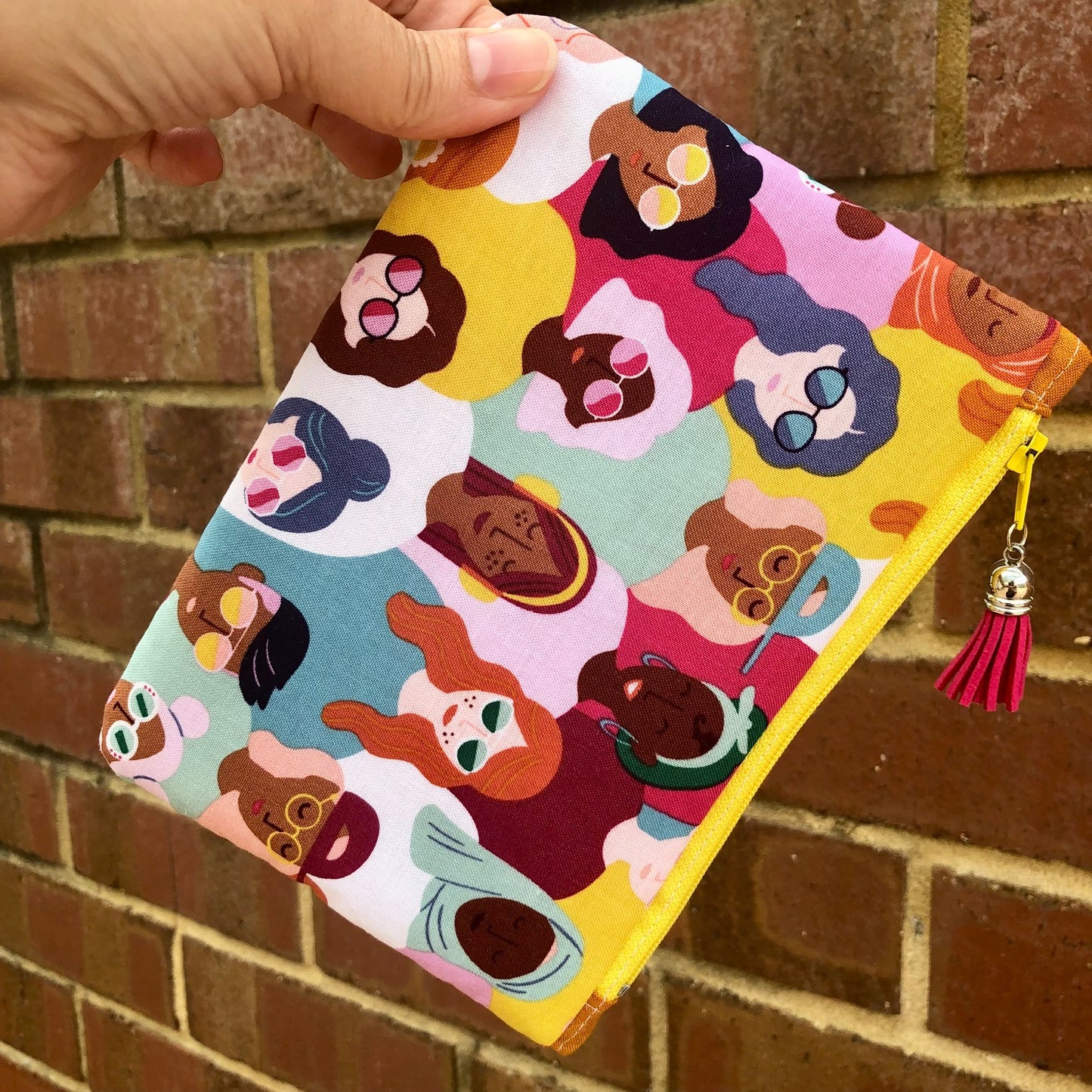 Girl Power lined zipper pouch with tassel