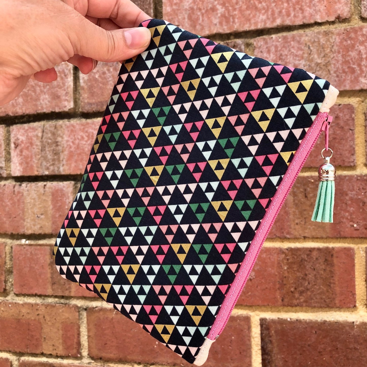 Gold Metallic Triangles lined zipper pouch with tassel