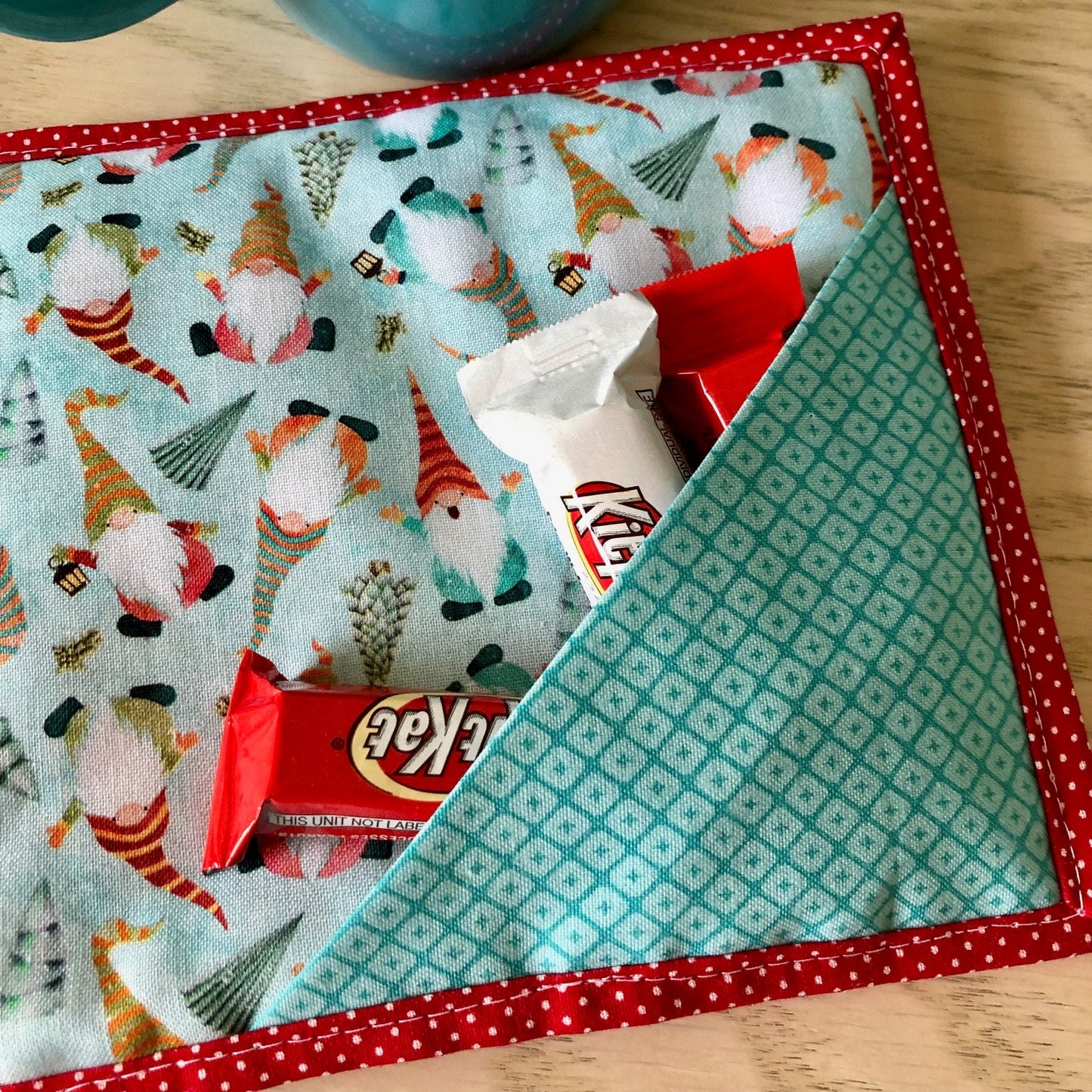 Christmas Gnomes quilted mug mat with treat pocket