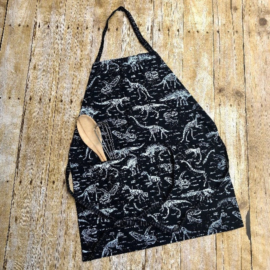 Glow-in-the-dark dinosaur adjustable apron with pockets