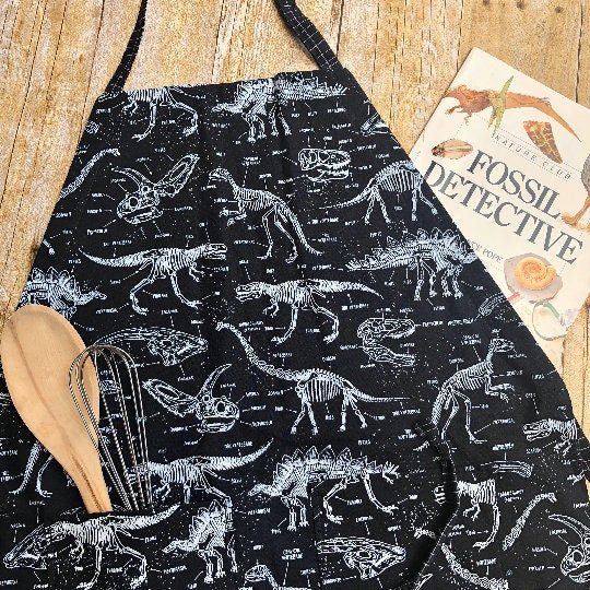 Glow-in-the-dark dinosaur adjustable apron with pockets